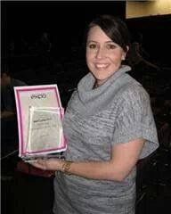 Jessica holding her South Australian Nail Professional of the Year certificate